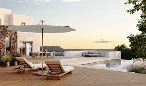 Ombrellone Infina Umbrosa dal design minimal e struttura elegante in alluminio. Copertura tesa con materiali premium e spedizione in circa 15 giorni.